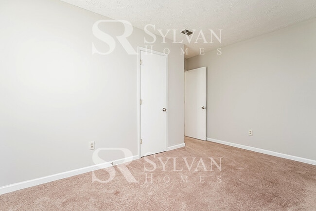 Building Photo - Lease today! No extra charge for contentme...