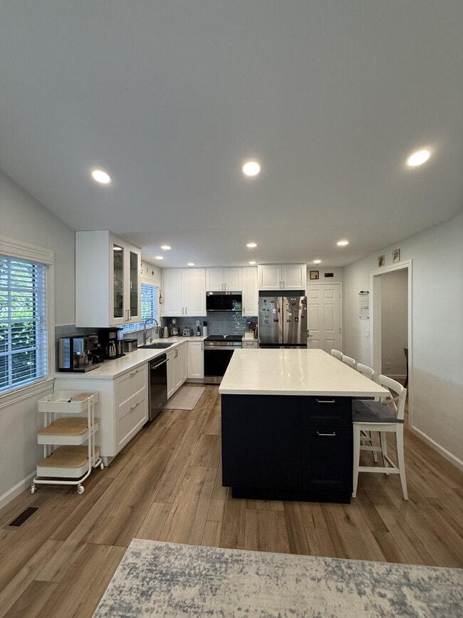 Building Photo - Stunning Fully Remodeled 4-Bedroom 2 Bathroom Home with Designer Kitchen & Spacious Open Layout i...