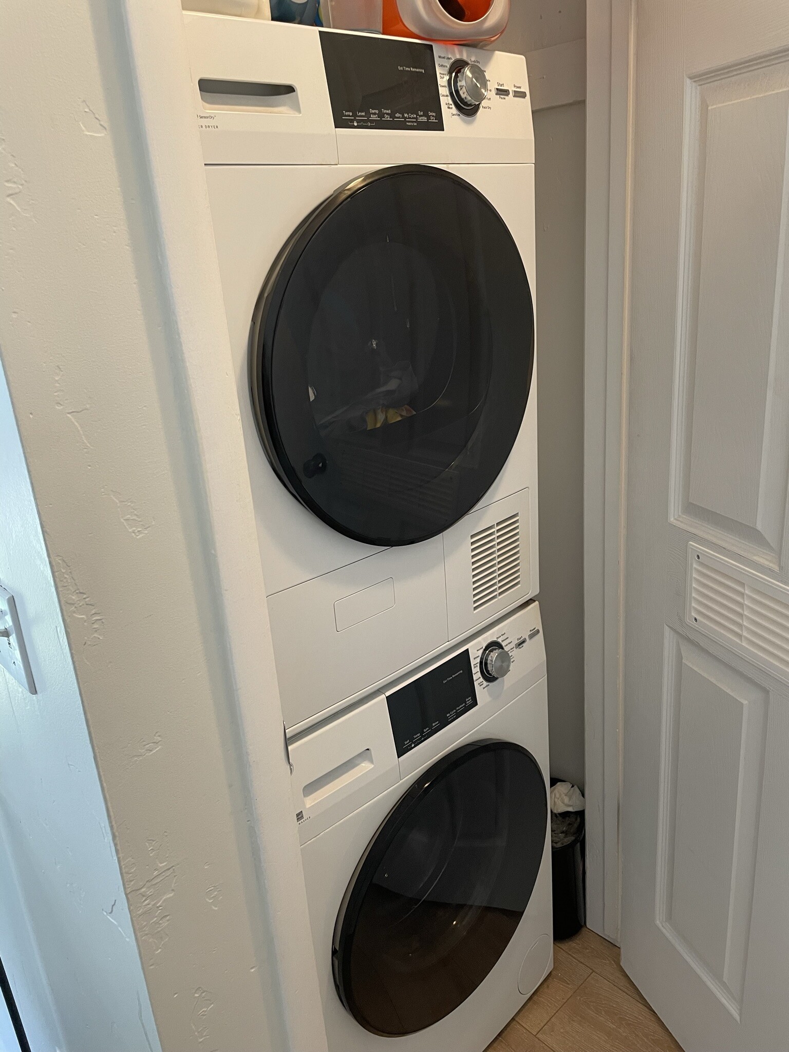 Small stacked front-load laundry units included with rental. - 5627 S Sarah Jane Dr