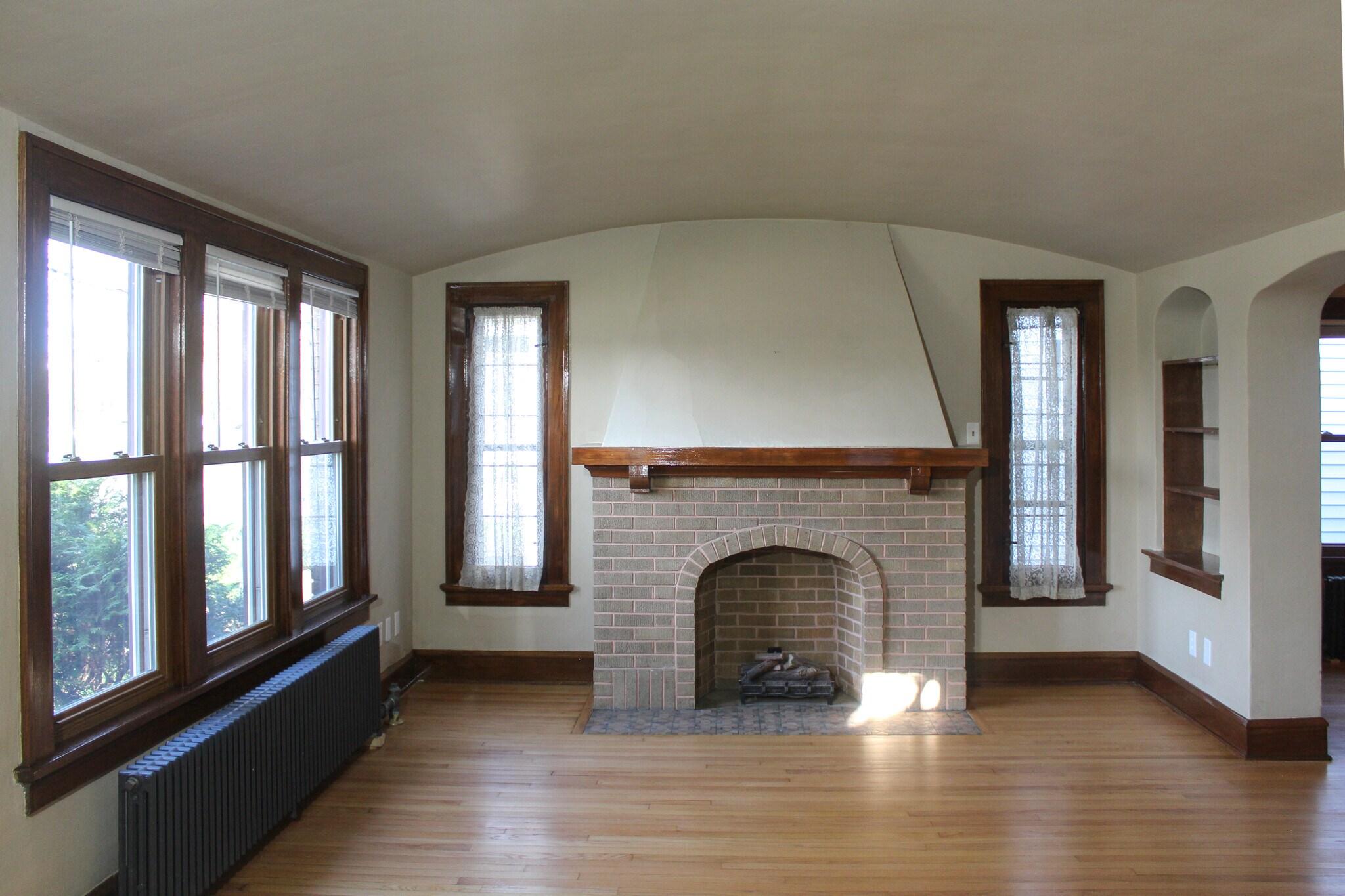 Electric fireplace, refinished woodwork - 5411 W National Ave