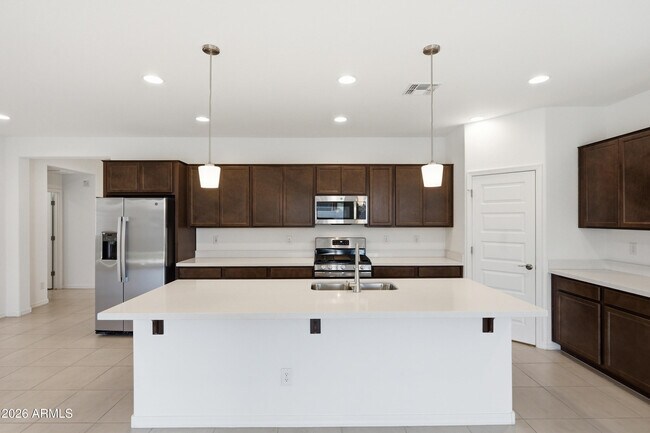 Building Photo - 3810 N 101st Dr