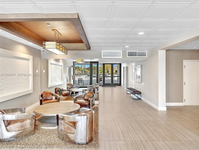 Building Photo - 3675 N Country Club Dr