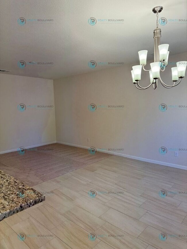 Building Photo - Luxury and Convenience Fully Equipped 3-Bedroom 2.5 Bathroom 2 Car Garage Townhome in Carson City