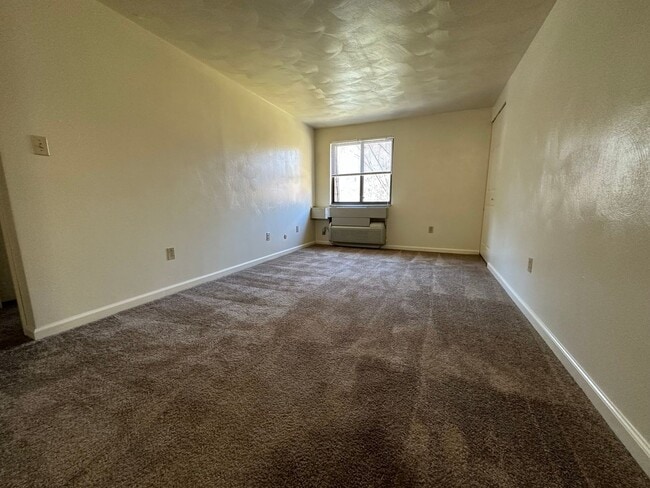 Building Photo - One Bedroom Apartment with Exposed Brick & Off-Street Parking! Tour this Stunning One Bedroom Today!