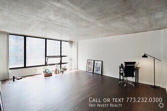 Building Photo - Available July 1st! Sun-filled Oversized 1...