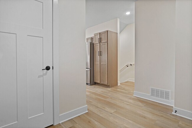 Building Photo - 3 Bed / 2.5 Bath Townhome w/Deck, Walkout Finished Basement, 9' Ceilings, Quartz Tops, Stainless ...