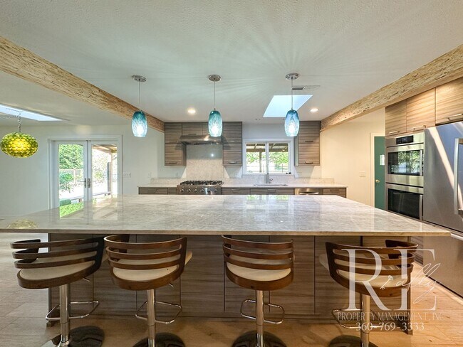 Building Photo - Mid-Century Modern Dream Home with Chef’s ...