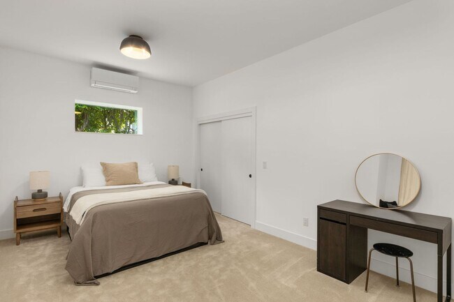 Building Photo - Stunning remodeled apartment with large walk-out patio