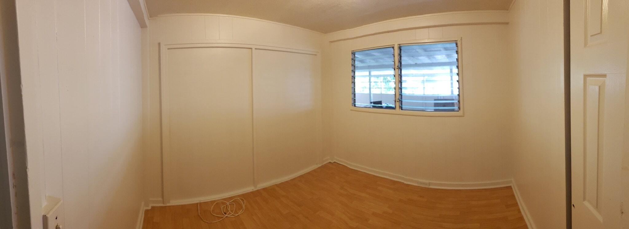 Unit C- View of bedroom #3. Bedroom has it's own closet. *Note- Image is panoramic photo. - 47 -411 Kamehameha Hwy