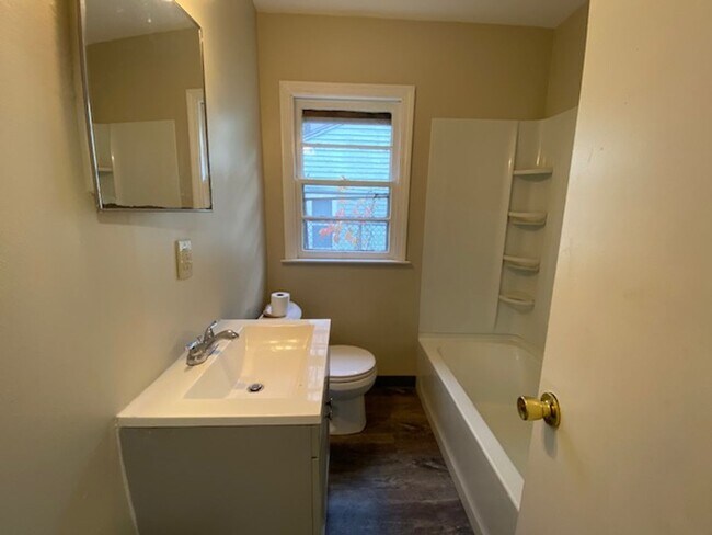 Building Photo - Charming West Akron Ranch with Walk-Through Sunroom