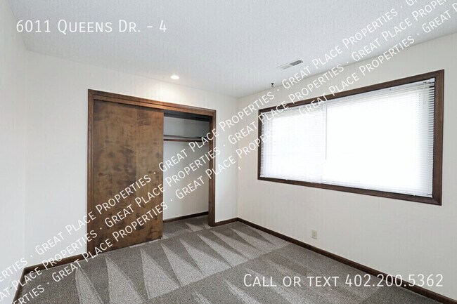 Building Photo - 6011 Queens Dr