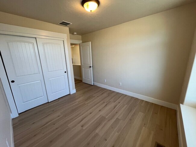 Building Photo - THREE-CAR GARAGE! This charming home offers 3 bedrooms, plus an office/rec room, and 2 bathrooms.