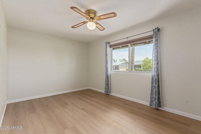 Building Photo - 12640 N Pebble Beach Dr