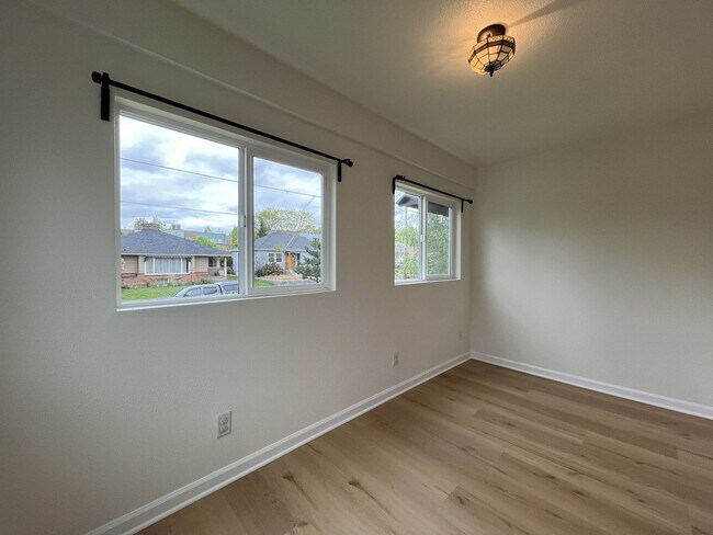 Building Photo - Character-Filled Concordia Home with Flexible Living Spaces & Gas Fireplace