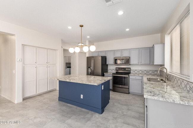 Building Photo - 5665 W Laurie Ln