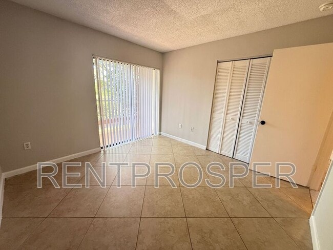 Building Photo - 6075 Village Cir S