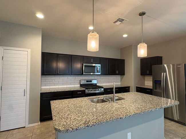 Building Photo - Move-In Ready 4 Bedroom Single Level Home in the Tartesso Community