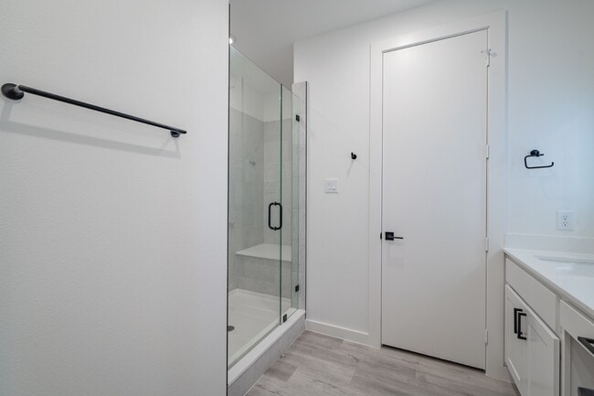 Building Photo - Gated Luxury Townhomes with yard + Roof Patio