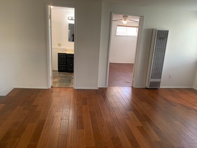 Living room view to master bedroom & bath - 3728 E 5th St