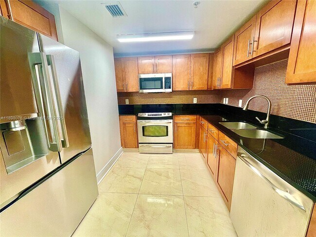 Building Photo - 8390 SW 72nd Ave