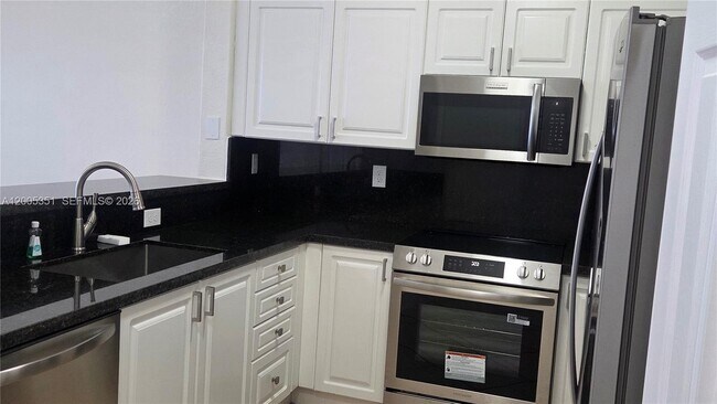 Building Photo - 5440 NW 107th Ave