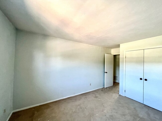 Building Photo - Three-bedroom, two-and-a-half bathrooms in...