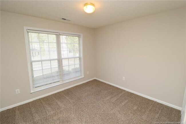 Building Photo - 305 Firefly Rd