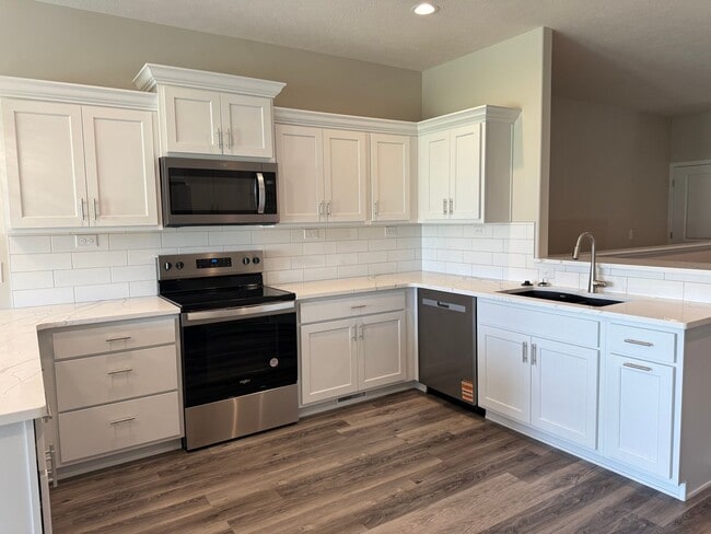Primary Photo - Brand new ranch townhome with 3 stall gara...