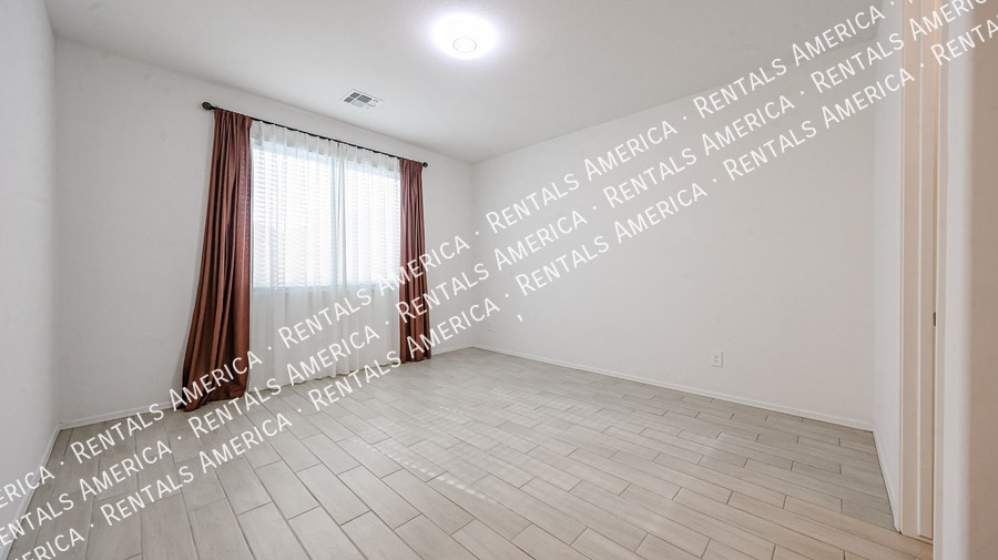 Building Photo - 15689 W Woodlands Ave