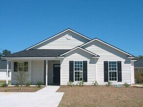 Building Photo - FOUR BEDROOM, TWO BATH IN HAHIRA