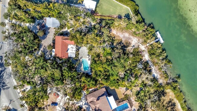 Building Photo - ALL THE CHARM! - Siesta Key 1+ acre on the Bay - 3 bed/ 2 bath pool home
