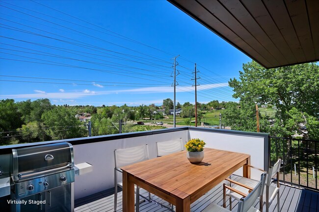 Building Photo - Modern 4-Bedroom Townhome with Rooftop Deck Near Sloan’s Lake & Light Rail