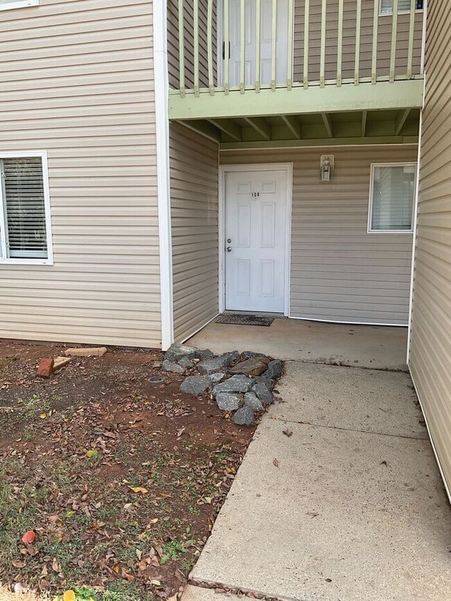 Building Photo - Just off the main road, but in walking dis...