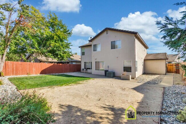 Building Photo - 5-Bedroom Residence Ready for Immediate Move-In