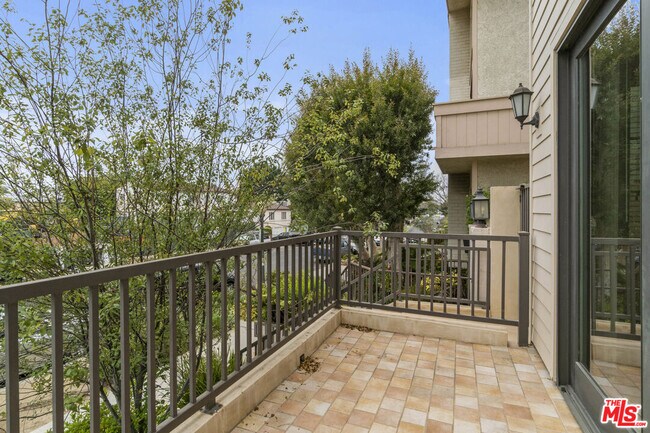 Building Photo - 10765 Wilkins Ave