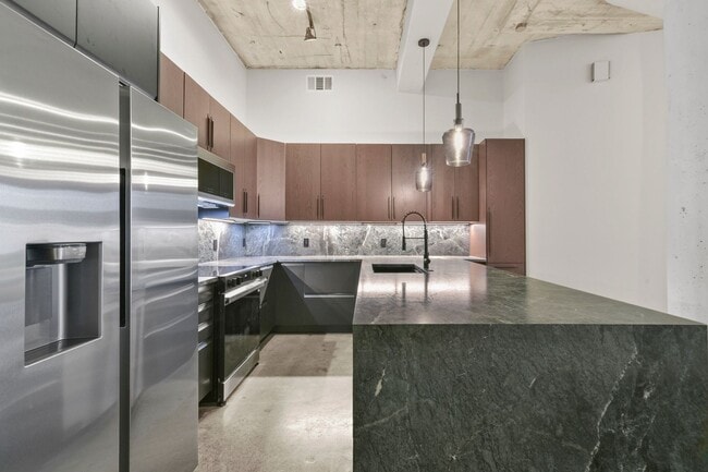 Building Photo - Modern Industrial Loft in the Heart of EADO!