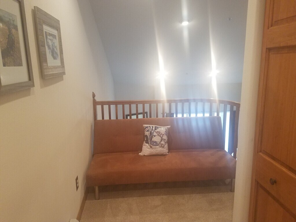 Linen closet and futon in loft area - 103 Morningstar Cir