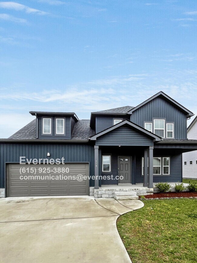 Primary Photo - Spacious 4-Bedroom Home with Modern Comfor...