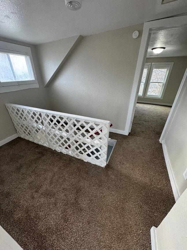 Building Photo - 4 bedroom/1 bath house w/storage building