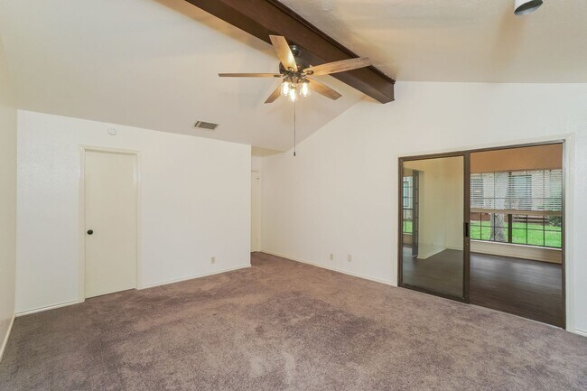 Building Photo - Charming 2-Bedroom Condo in Gated Community Surrounded by Mature Trees