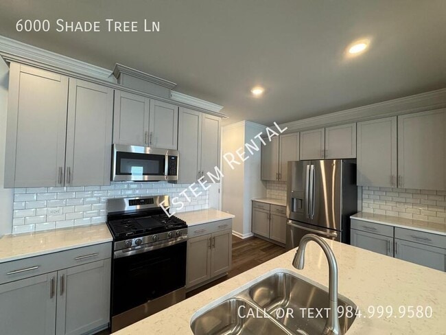 Building Photo - 6000 Shade Tree Ln