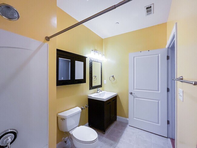 Building Photo - COMING SOON! Charlotte Living at Its Best! 2BR/2BA End Unit + Chef’s Kitchen & Water Included!