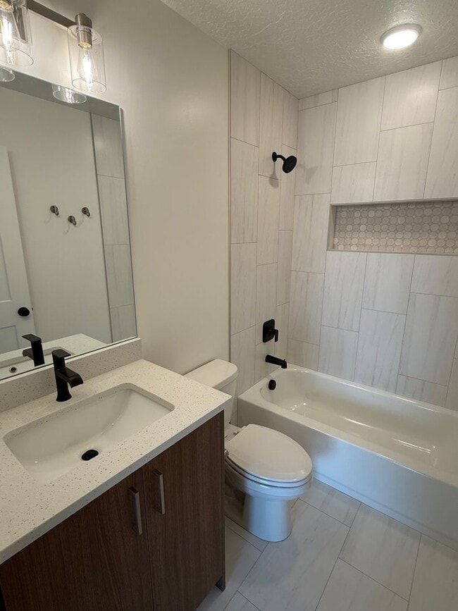 Building Photo - Half off first months rent - Beautiful townhome with 2 car garage, Central Air and Master Suite