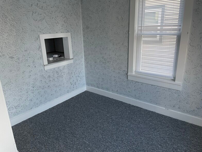 Dining room with passthrough to kitchen :) - 450 3rd Ave