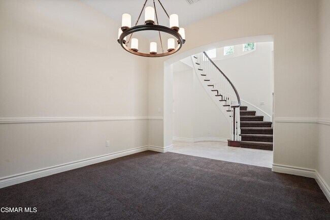 Building Photo - 6077 Mandeville Pl