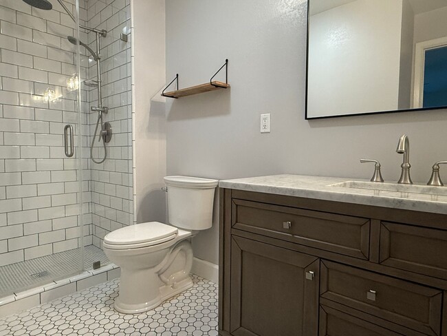 Building Photo - Remodeled 4 Bedroom 2 Bath Home in the des...