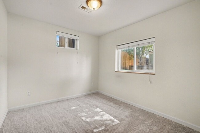 Building Photo - Spacious 4-Bedroom, 2-Bath Home with Large Yard, Garage & Central A/C