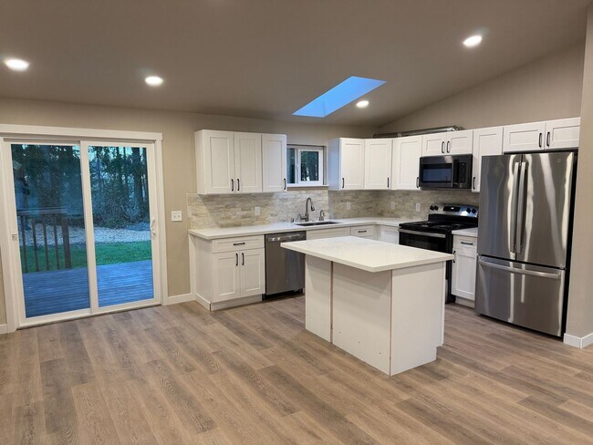 Building Photo - COMING SOON!!  Private, Adorable, Clean and completely Remodeled