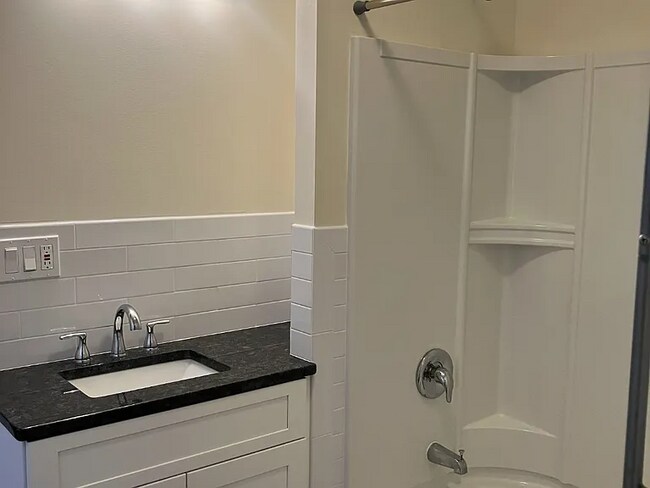 Building Photo - Freshly painted apartment ready for move-in.