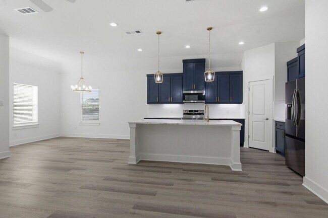 Building Photo - "New Construction 3-2-2 Home with Designer Touches Throughout!"
